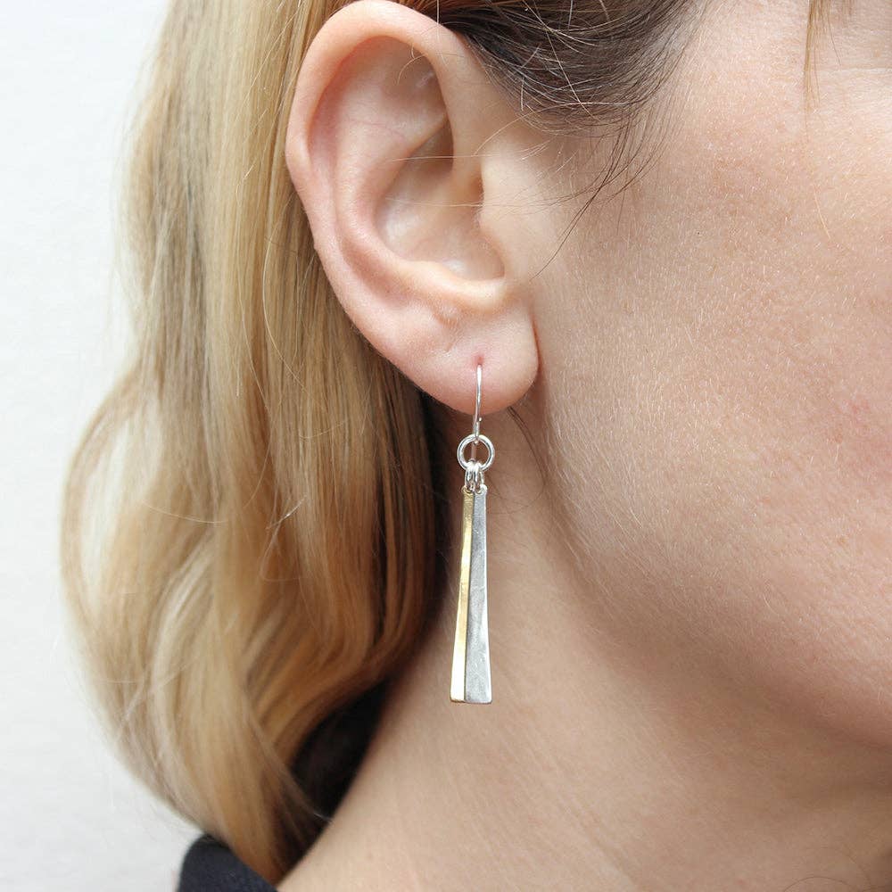 Thin Rays Wire Earrings by Marjorie Baer worn by a model, illustrating the elegant, minimalist design with a focus on fit and style.