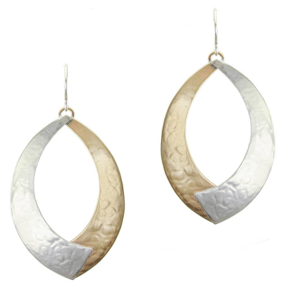 Large Overlap Swoops Wire Earring featuring two large layered and lightly hammered brass and silver swoops, measuring 1.25 inches wide by 1.8 inches tall, designed by Marjorie Baer.