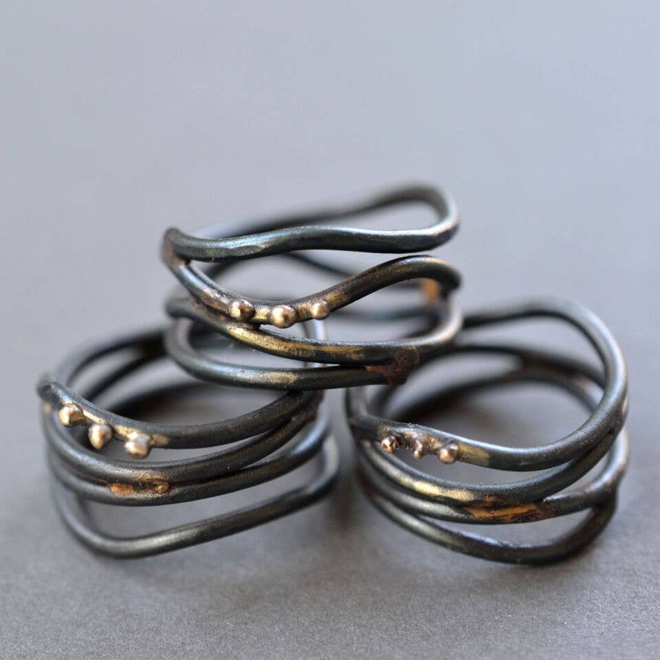 Linear Wrap Ring by Metamorphosis Metals: for those who like their bling vine-inspired and with a side of organic charm!