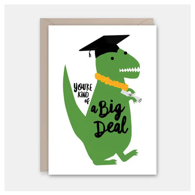 Graduation card featuring a cartoon dinosaur in a graduation cap, holding a diploma, saying 'You're kind of a Big Deal'. Part of the Graduation Card Collection by ARTISANS & agency.