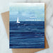 Elegant Father's Day card from ARTISANS & agency illustrating a peaceful blue watercolor style with a sailboat and 'Happy Father's Day' text, part of the Father's Day Card Collection.