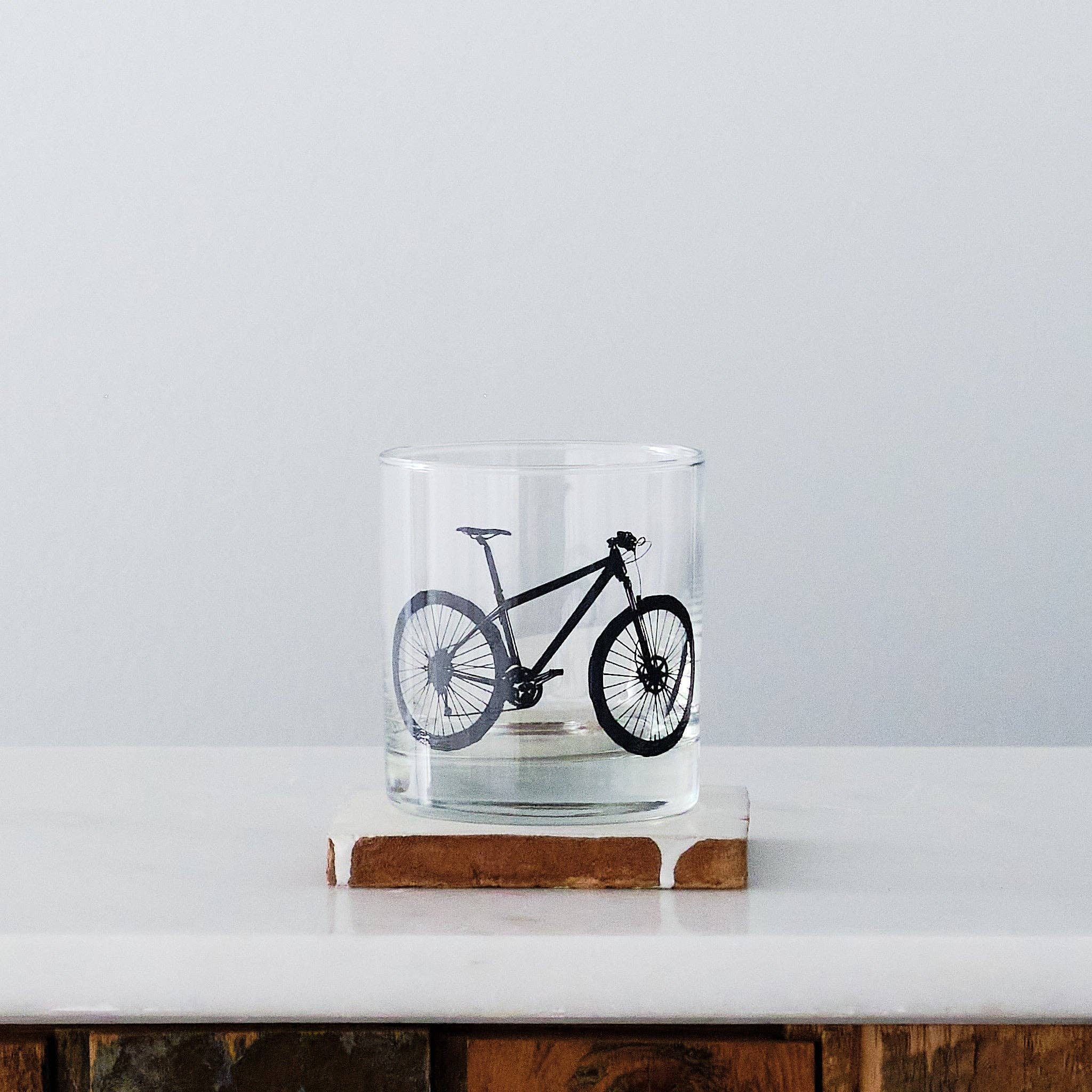 Mountain Bike Rocks Glasses showcasing the stylish design, perfect for cocktails, milk, or as a unique pencil cup.