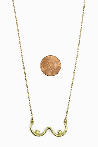 The Girls Pendant - A delightful brass charm celebrating sisterhood, perfect for wearing solo or layering, with the word 'girls' on a chic 18-inch brass chain, ready to make your friends jealous!