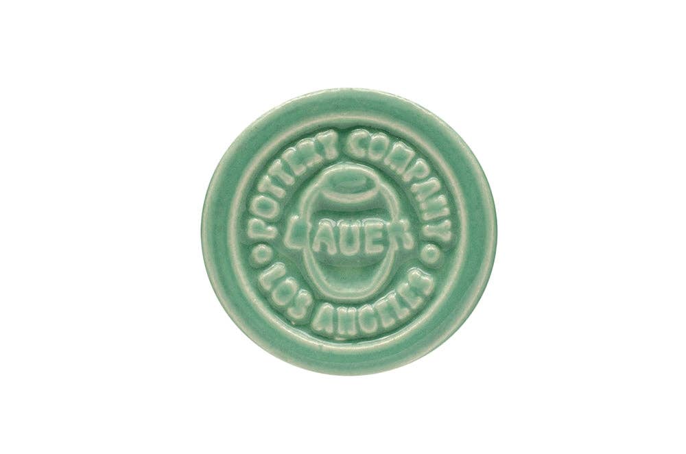 Aqua ceramic stamp with Bauer Pottery Company