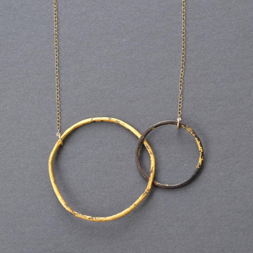 Interlocking Circles Necklace Steel & Gold - A striking mix of heavy gauge steel and 23k gold that’ll make other necklaces green with envy!