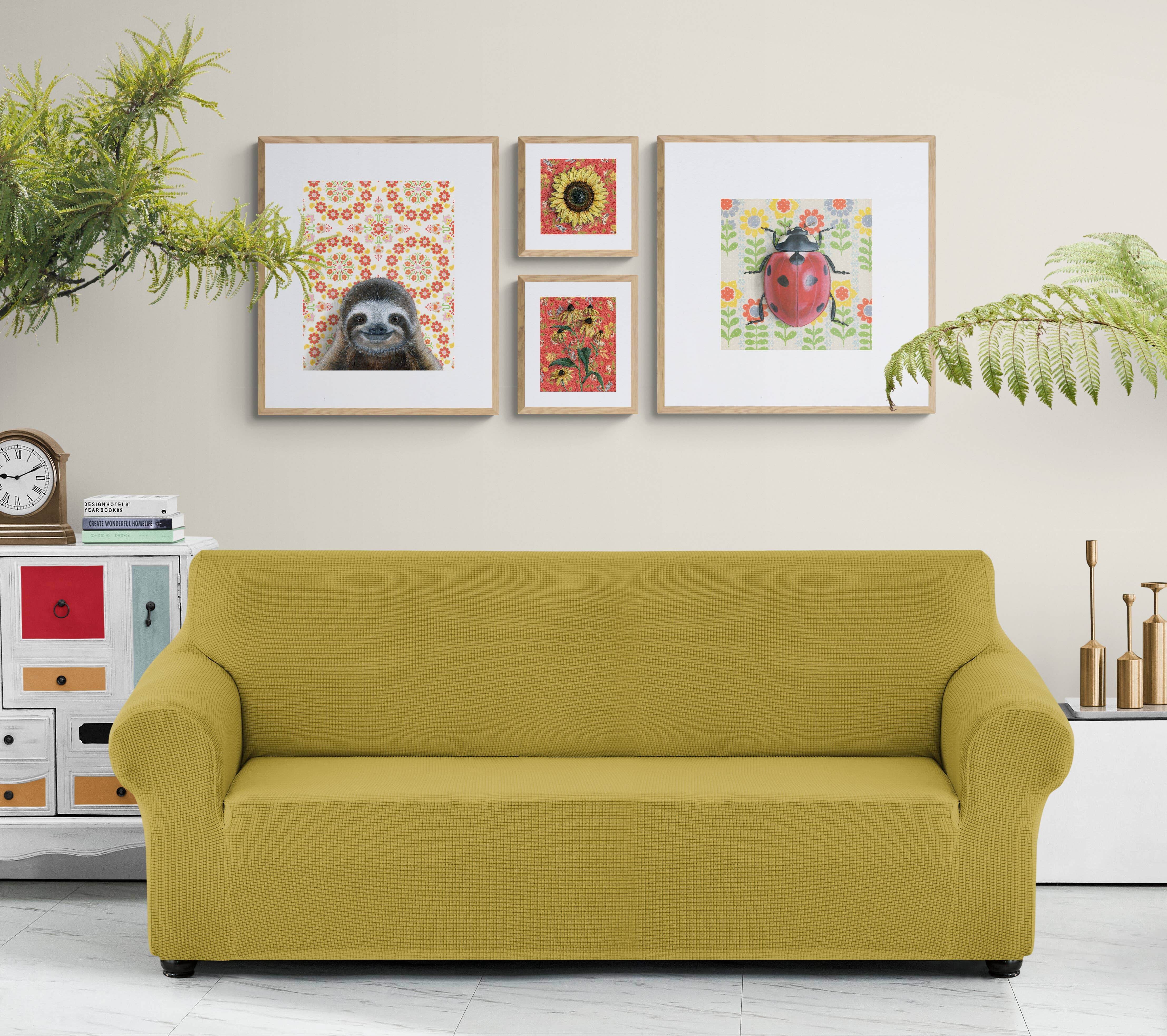4 framed art prints above a couch