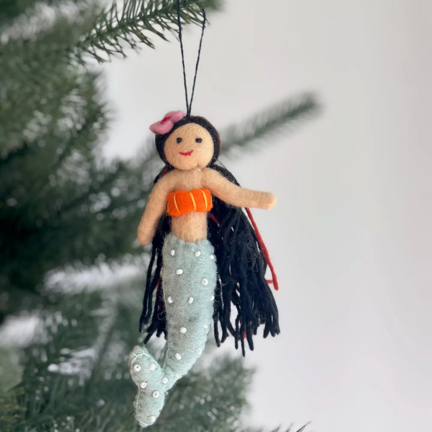 Felt Mermaid Ornaments featuring vibrant tails and beautiful seashell tops, perfect for adding a touch of coastal magic to your holiday decor.