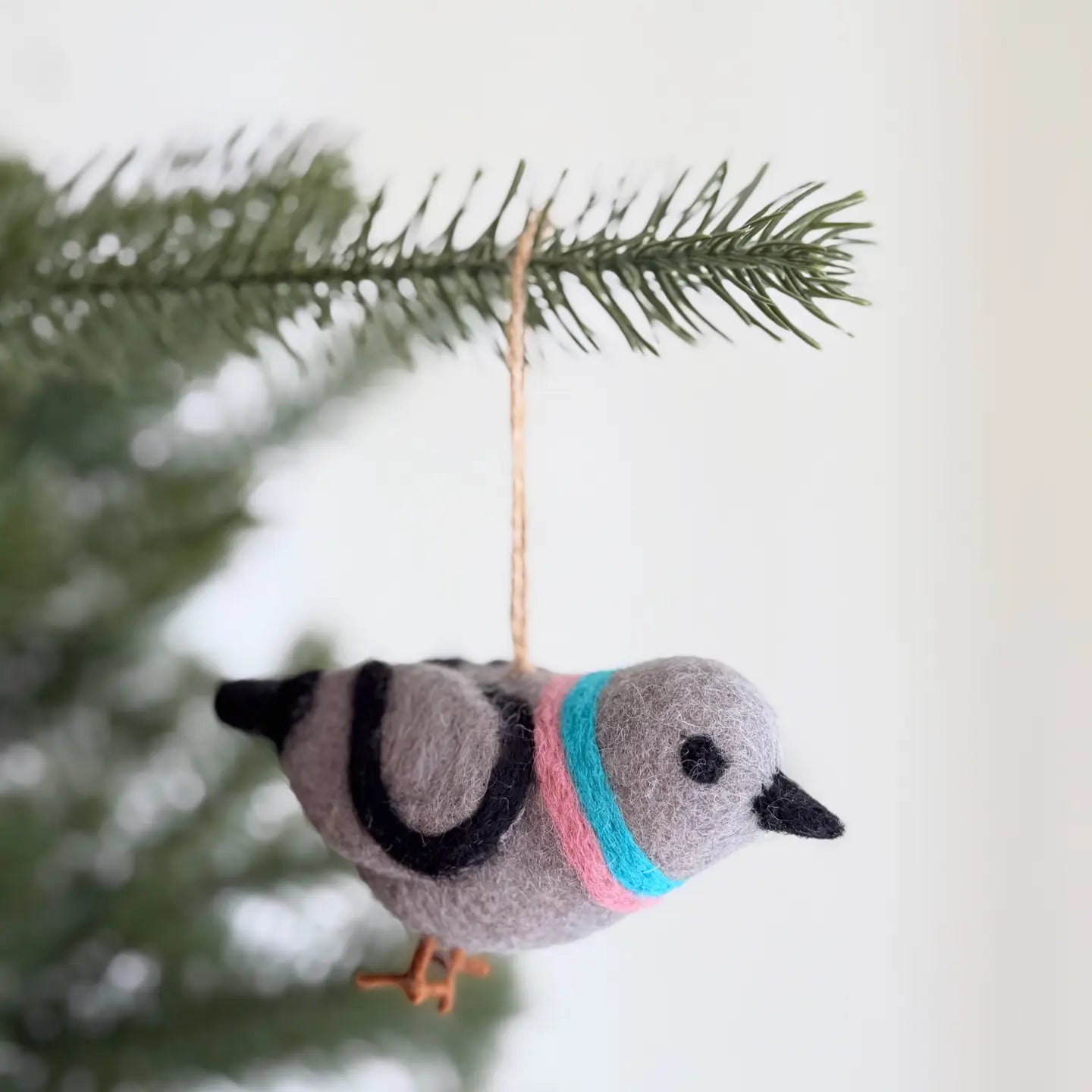 Fair-trade Felt Bird Ornaments brightening up holiday spaces with playful designs.