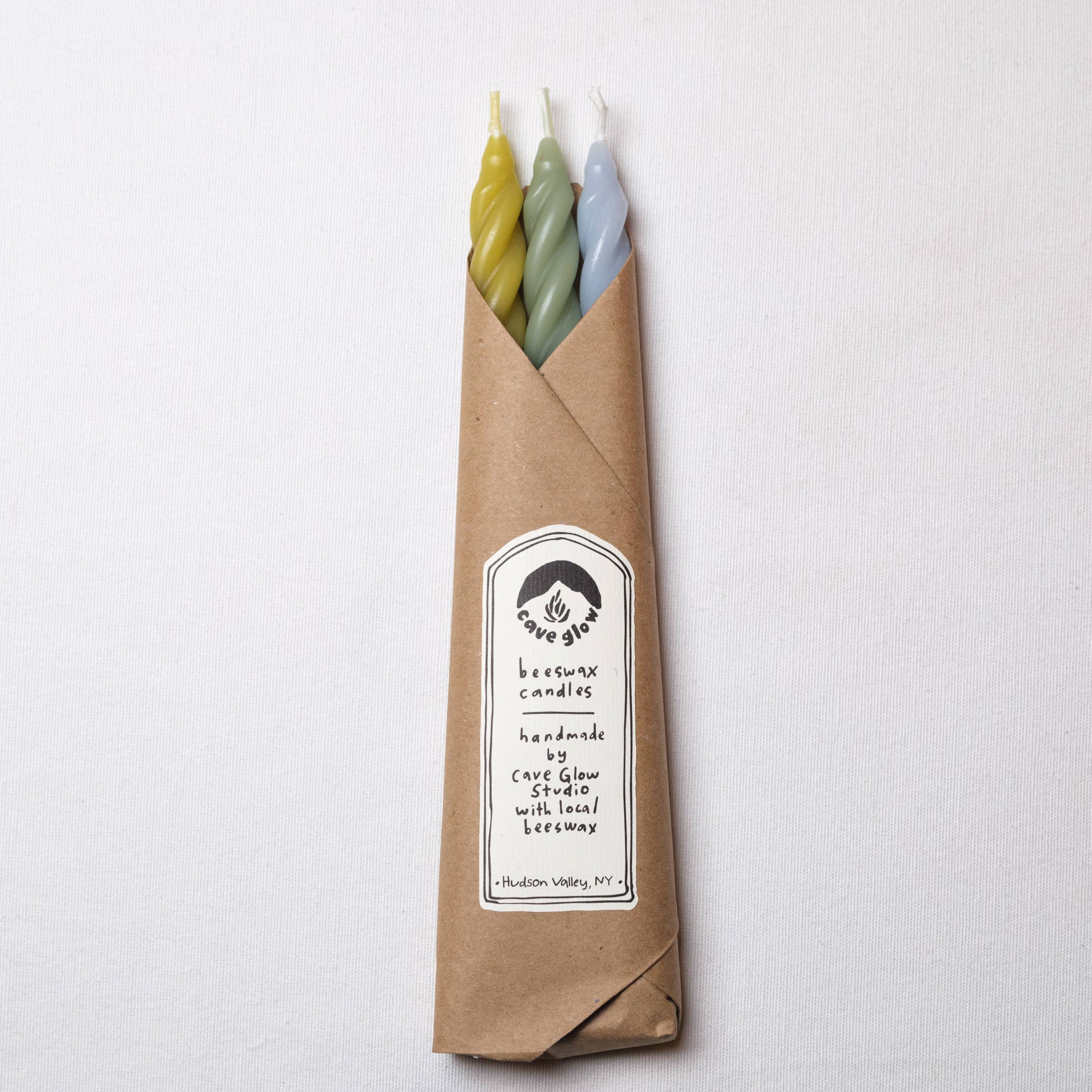 Wrapped Beeswax Spiral candles by Cave glow studio