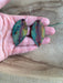 Close-up view of Botanical Large Leaf Fire Painted Copper Earrings showcasing the intricate details and unique artwork from heat treatment.