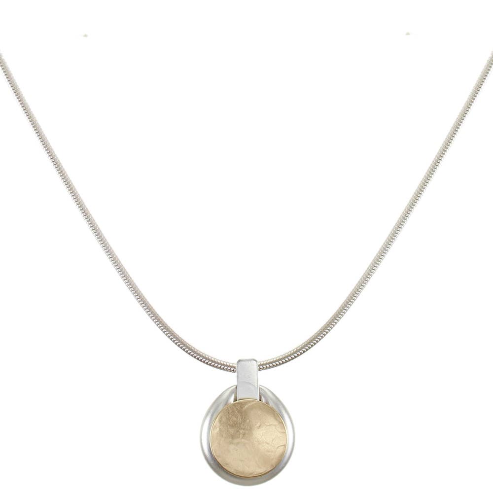 Small Button Necklace by Marjorie Baer featuring a brass and silver button pendant on a refined silver snake chain.