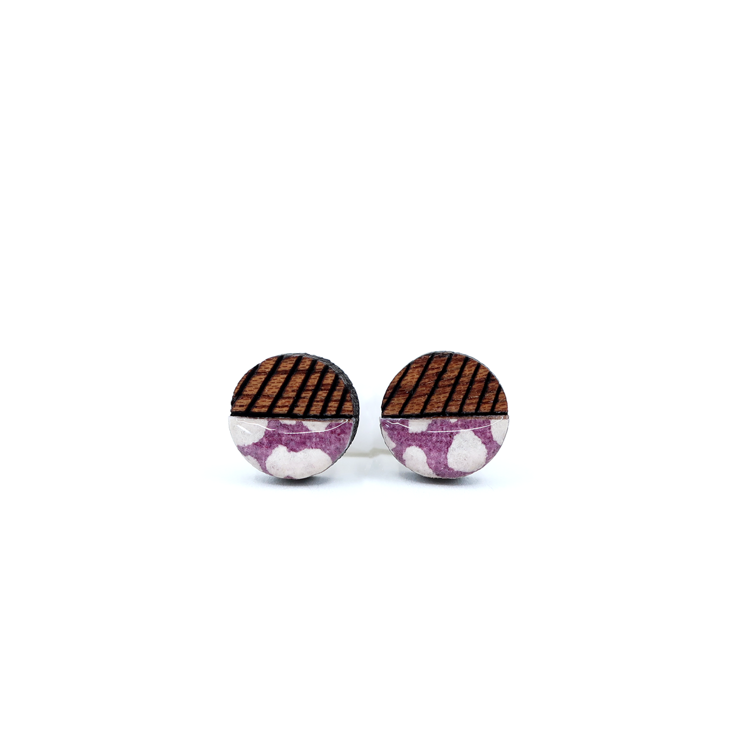 Close-up view of Mini geometric color block titanium studs, featuring UV-cured resin coating and nickel-free titanium posts ideal for sensitive ears.