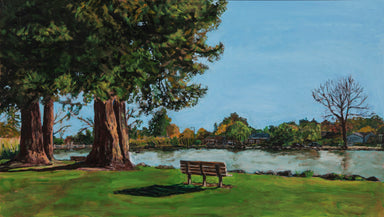 Chris Hinck painting bench near lake