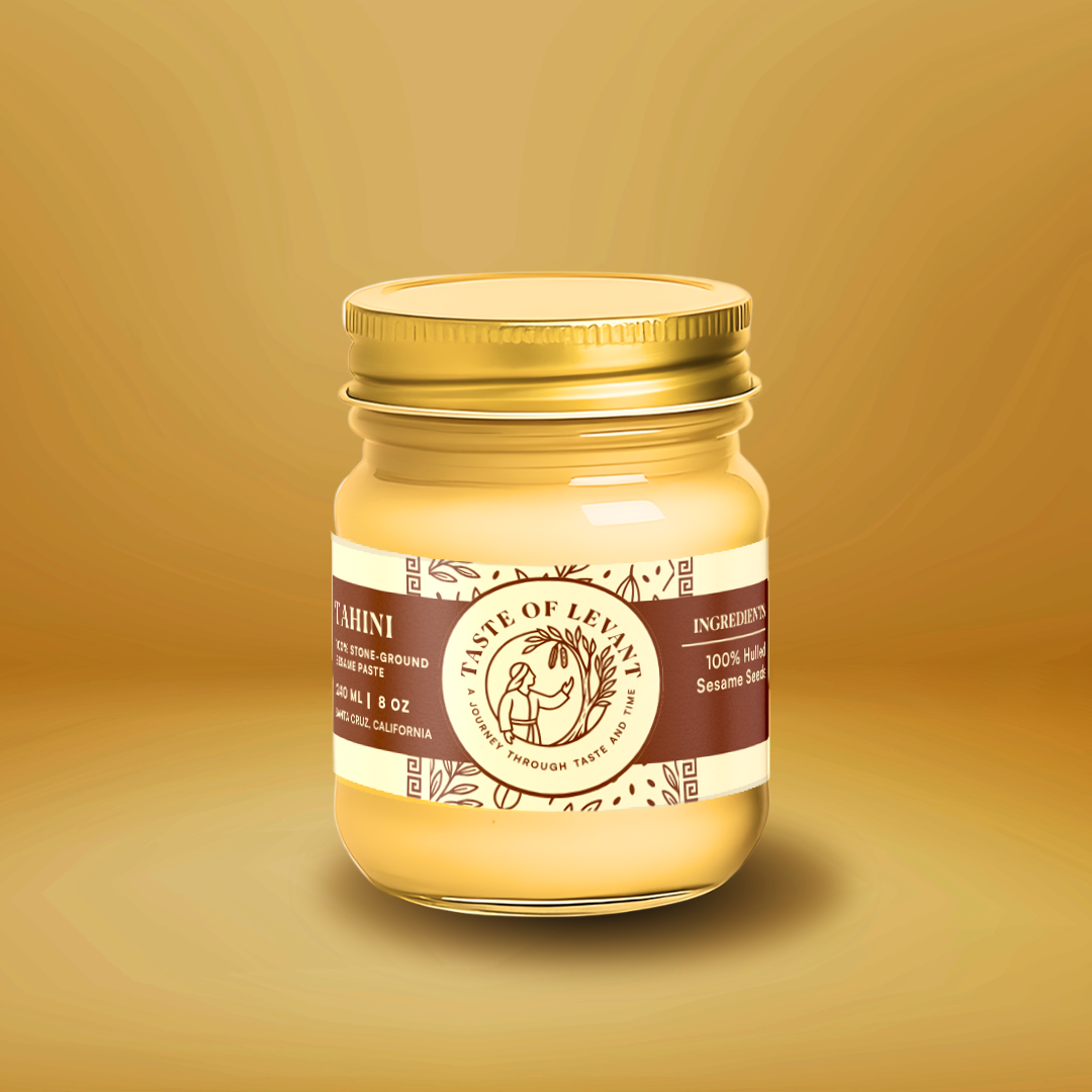 Smooth and creamy Tahini made from finely ground sesame seeds, perfect for enhancing sweet and savory dishes.