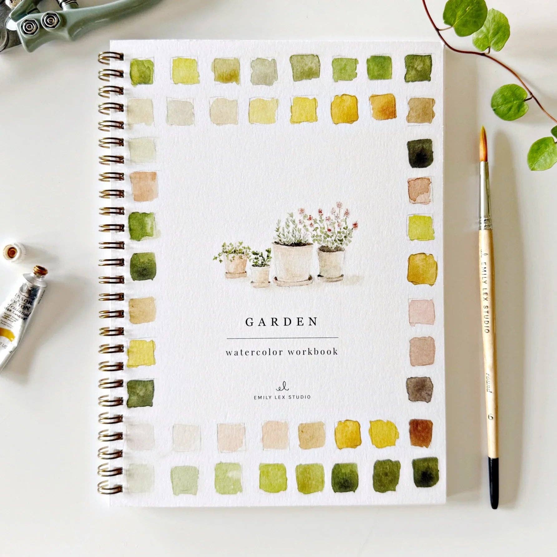 Garden watercolor workbook by Emily Lex Studio featuring simple outlined sketches perfect for painting with watercolors, suitable for both kids and adults.