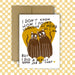 Greeting card with two cats and humorous text on a checkered background
