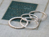 Snazzy Silver Stacking Rings - set of 4, made for those daring fashionistas! Featuring a unique dashed texture, these rings are literally a stack of fun!