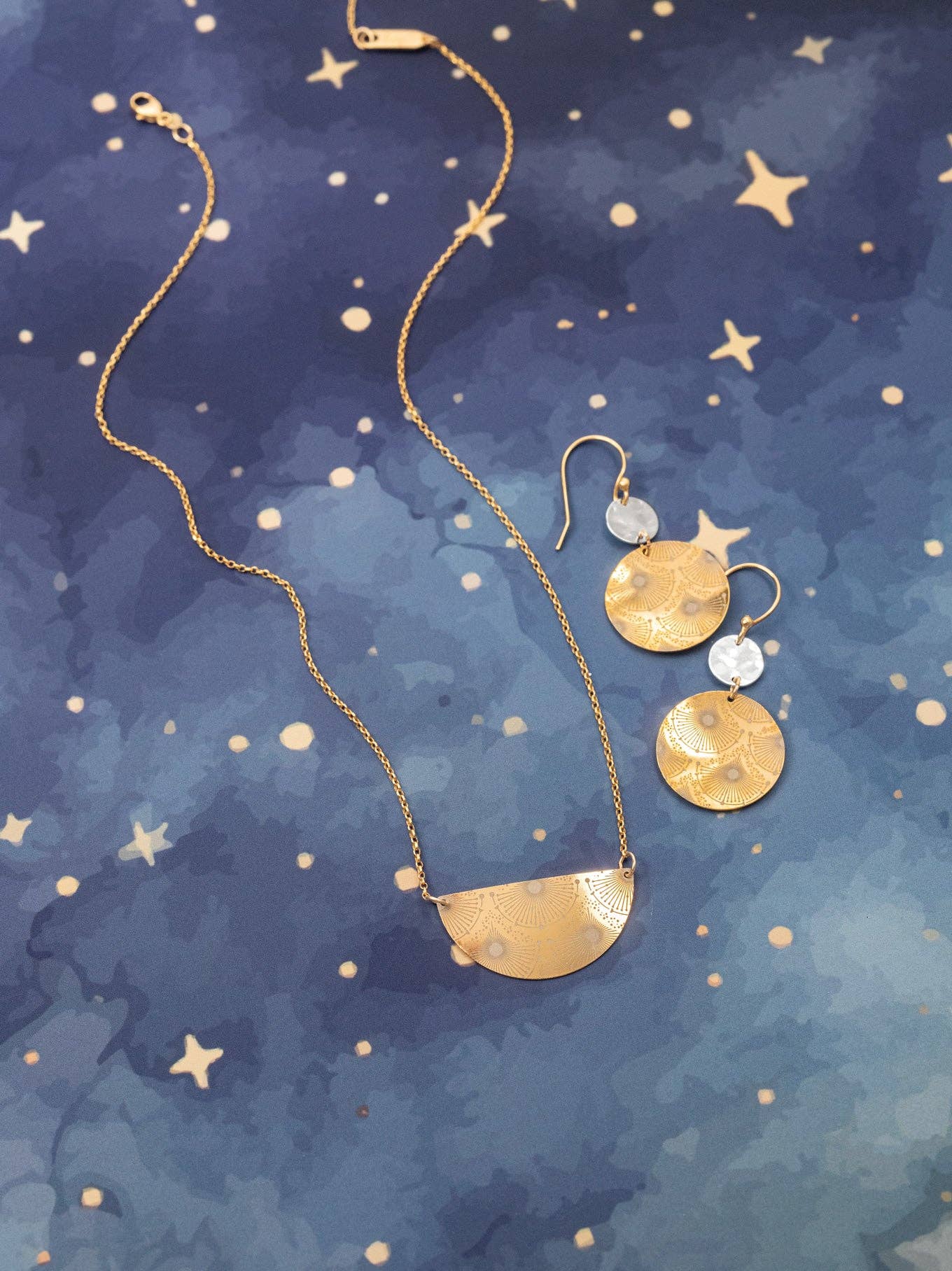 The Danica Earrings on a model, proving that wearing cosmic chic is the best way to keep your look out of this world!