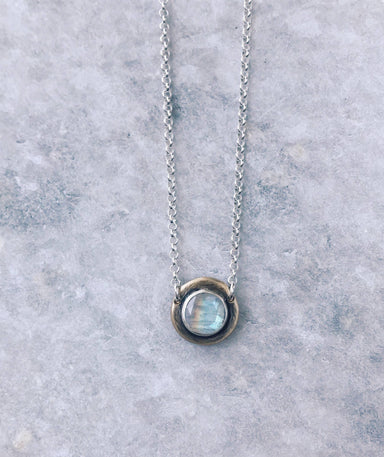  rainbow moonstone with a silver chain. 