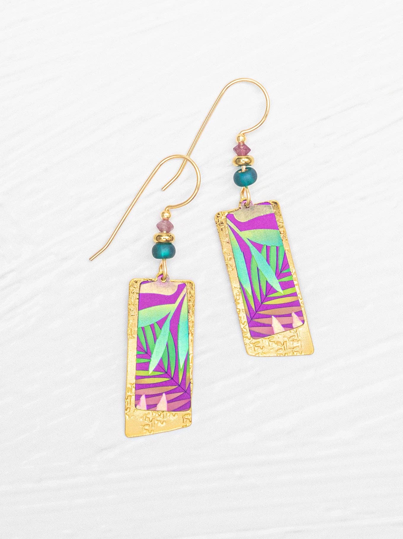 Davy Earrings by Holly Yashi - the stunning 1 7/8" long, 1/2" wide jewelry that says, 'I'm fancy, but I also enjoy pizza in pajamas!' Featuring gold fill ear wires and niobium with a touch of 18K gold-plating, the ultimate blend of elegance and comfort!