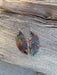 Fashionable Western Feather Copper Earrings featured on a decorative card symbolizing love and beauty.