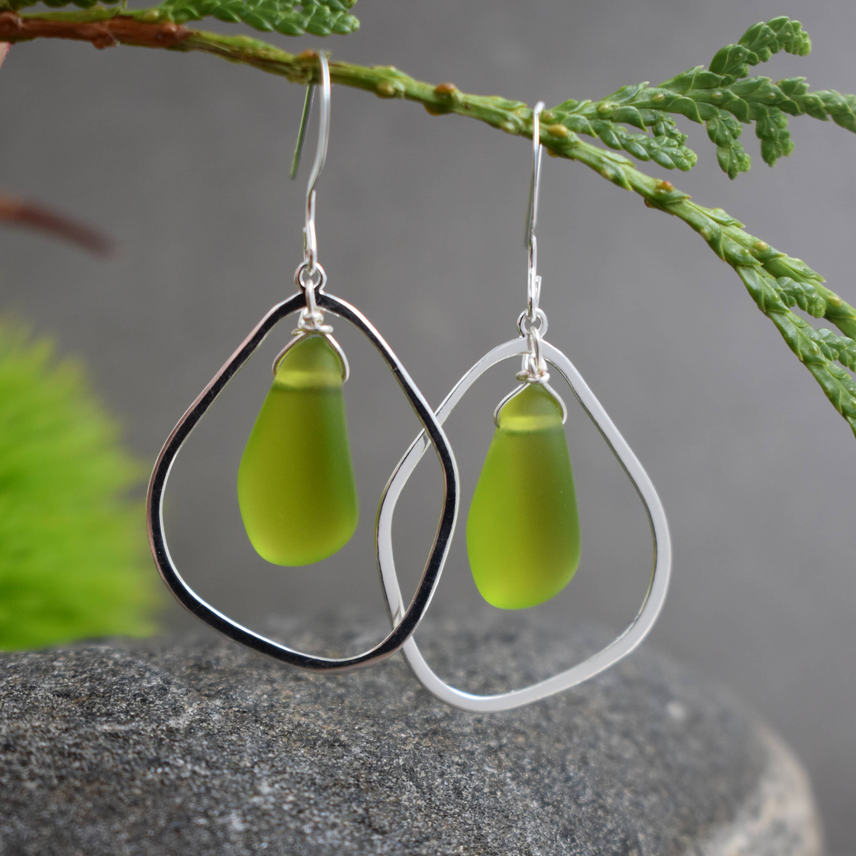Stunning Green Eco Glass Teardrop Frame Earrings showcasing vibrant green eco glass within polished teardrop frames.