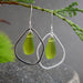 Stunning Green Eco Glass Teardrop Frame Earrings showcasing vibrant green eco glass within polished teardrop frames.