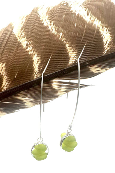 Green Glass Dangles by Suzanna Garrett Designs — green sea glass does the color work here—and it does plenty