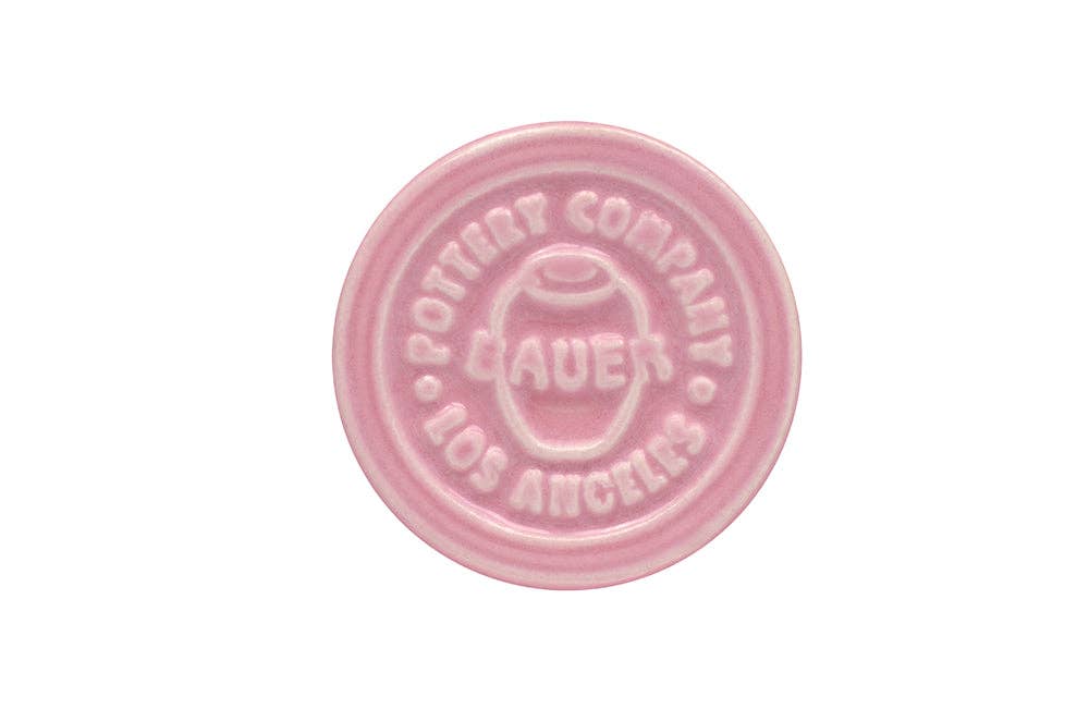 Pink ceramic stamp with Bauer Pottery Company