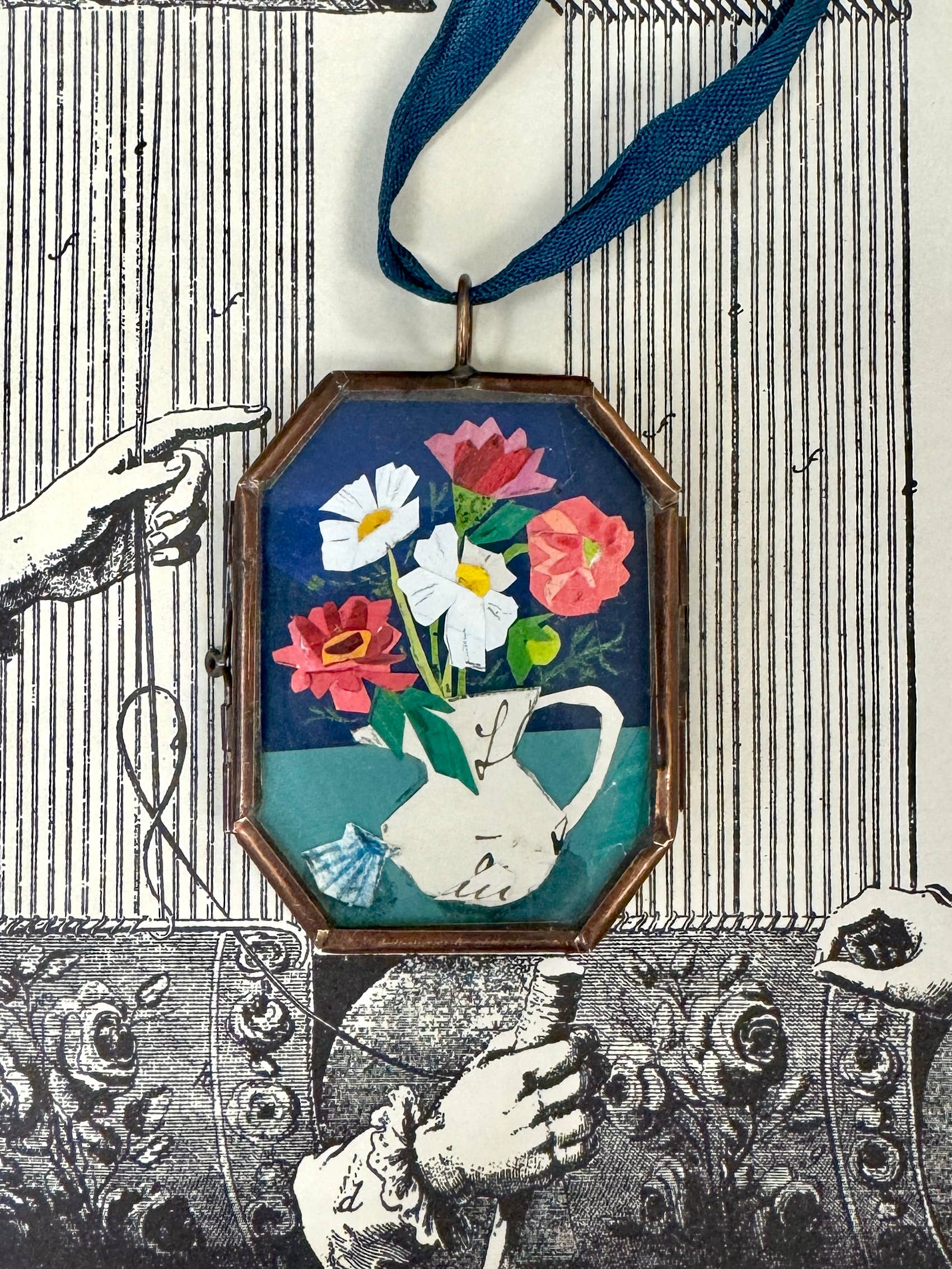 Vintage-style flowers in a vase art locket ornament.