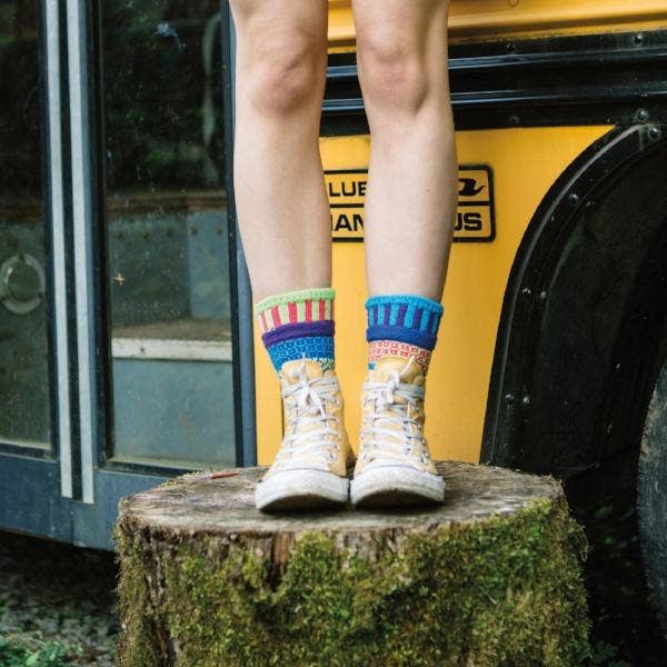 Close-up view of Bluebell Crew Socks showcasing the intricate pattern and colorful design, made from recycled materials.