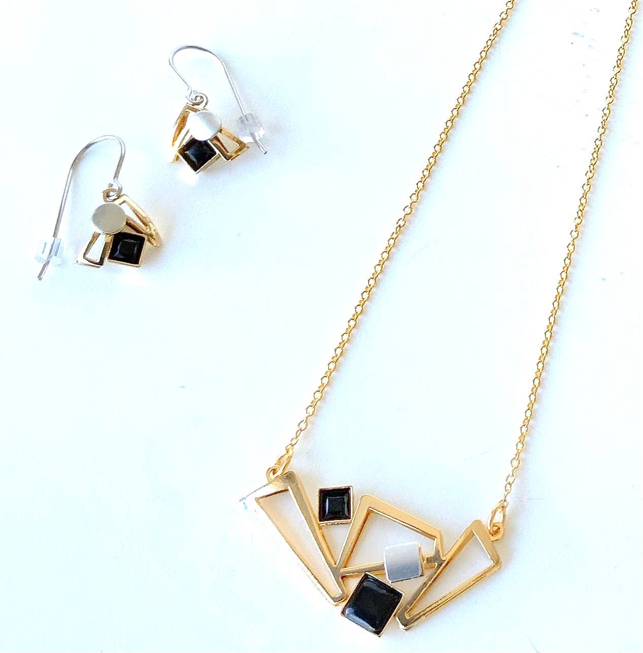 steel jewelry with black gemstones