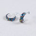 Petite Crystal & Silver Huggie Earrings showcasing a unique colorful design for a fresh look. Vibrantly colored crystals adorn high-quality silver, perfect for any outfit.