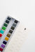 24 Color Watercolor Paint Palette in a compact metal tin, ideal for artists of all skill levels, showcasing vibrant colors for painting and mixing.