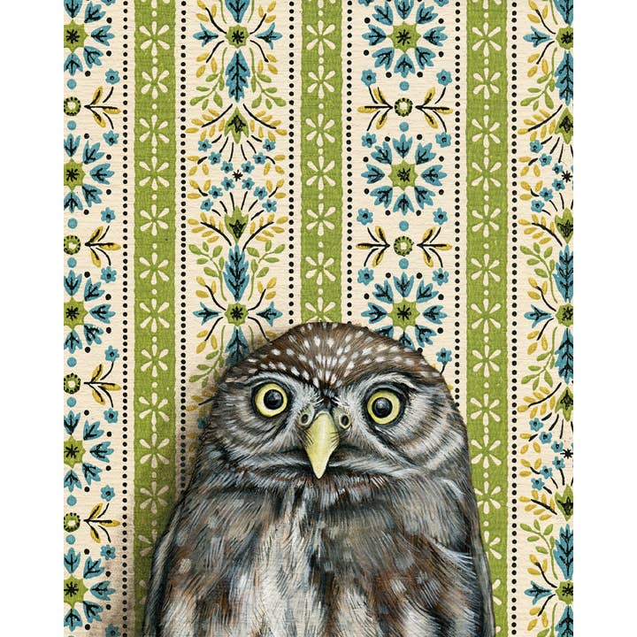 Framed art print of an owl on a patterned background