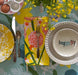 Allium Napkin Set laid out on a table, adding a touch of sunshine and fun to your mealtime setting.