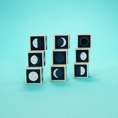 Uncle Goose Moon Phase Blocks set featuring all eight moon phases, perfect for aspiring astronauts and moon lovers.