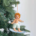 Felt Surfer Boy Ornament in black, capturing the joy of summer, an ideal playful decoration for festive settings.