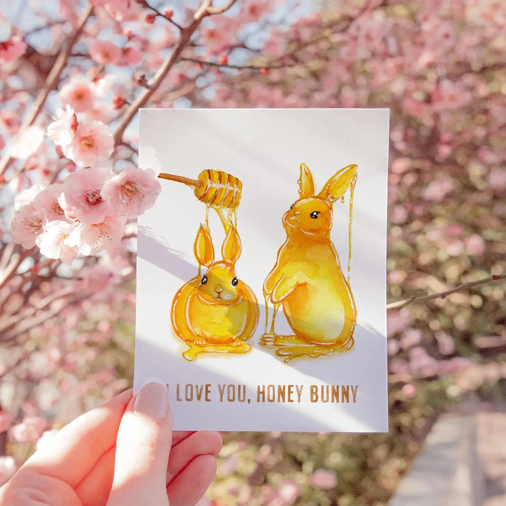 Rabbits covered in honey I love you Honey Bunny Greeting card
