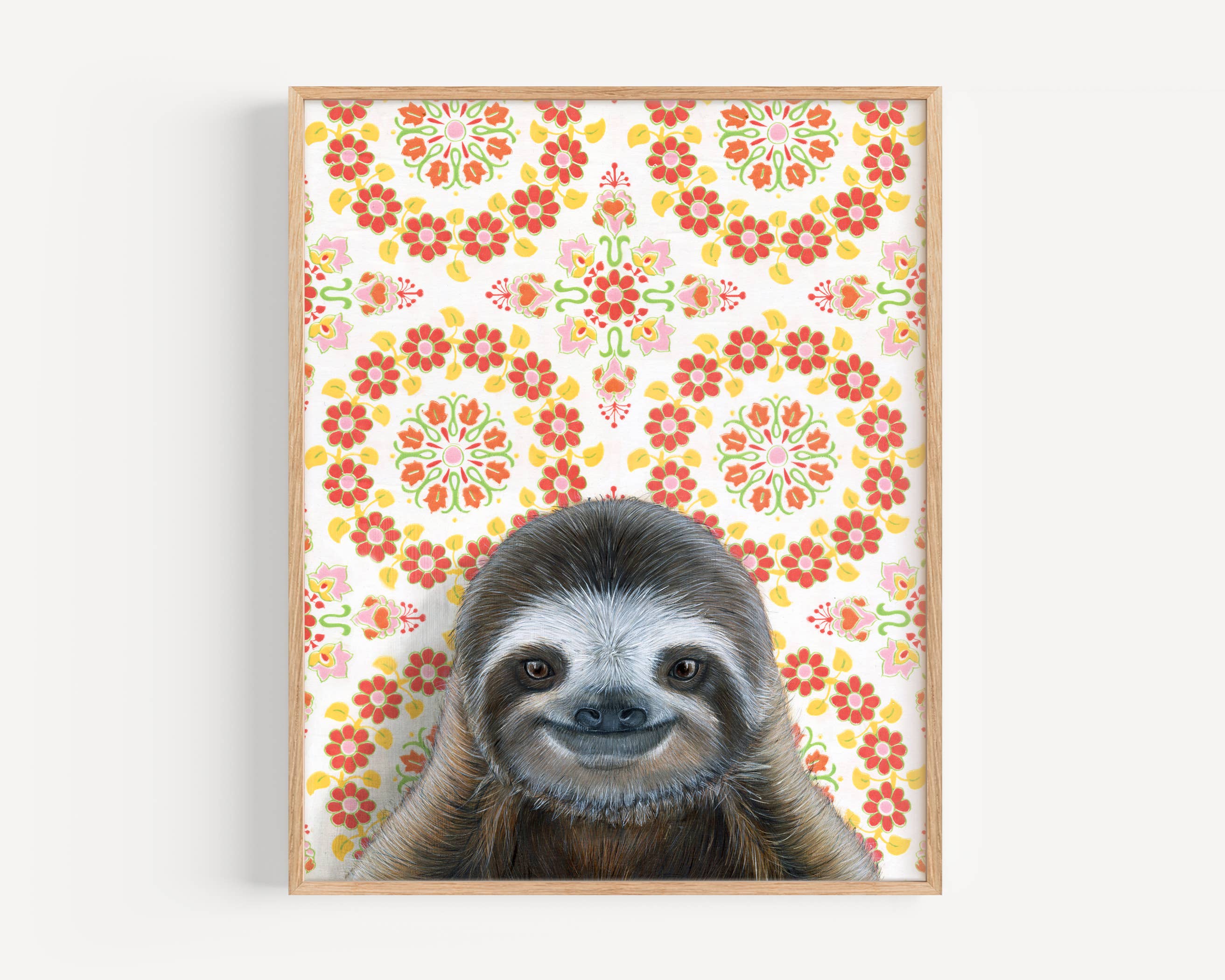 Framed art print of an sloth on a patterned background