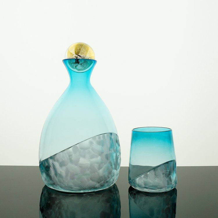 Blue glass decanter with beaker