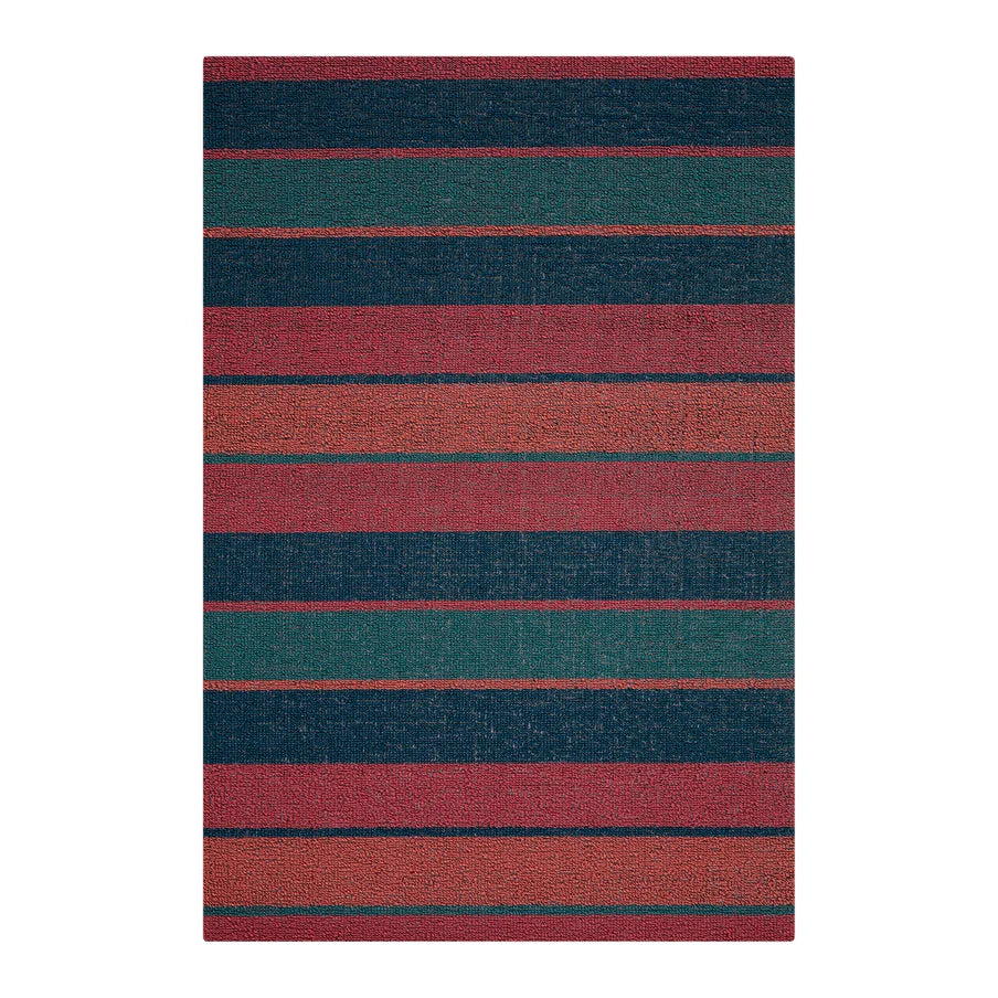 Chilewich Bolt Stripe Shag Mat | Raspberry, a colorful indoor and outdoor striped mat made with durable looped TerraStrand yarns