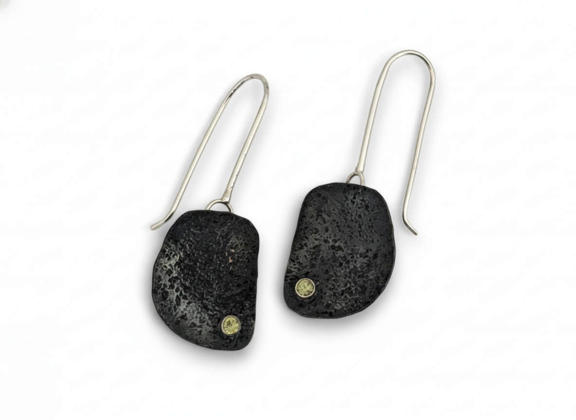 Peridot Stones Set in a Dark Copper Form