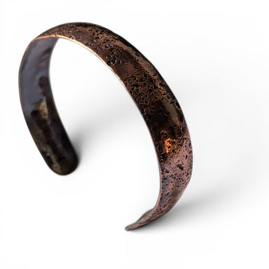 Copper Domed Cuff Bracelet, handmade by Deb Collins, showcasing unique organic shapes and textured designs inspired by nature.