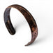 Copper Domed Cuff Bracelet, handmade by Deb Collins, showcasing unique organic shapes and textured designs inspired by nature.