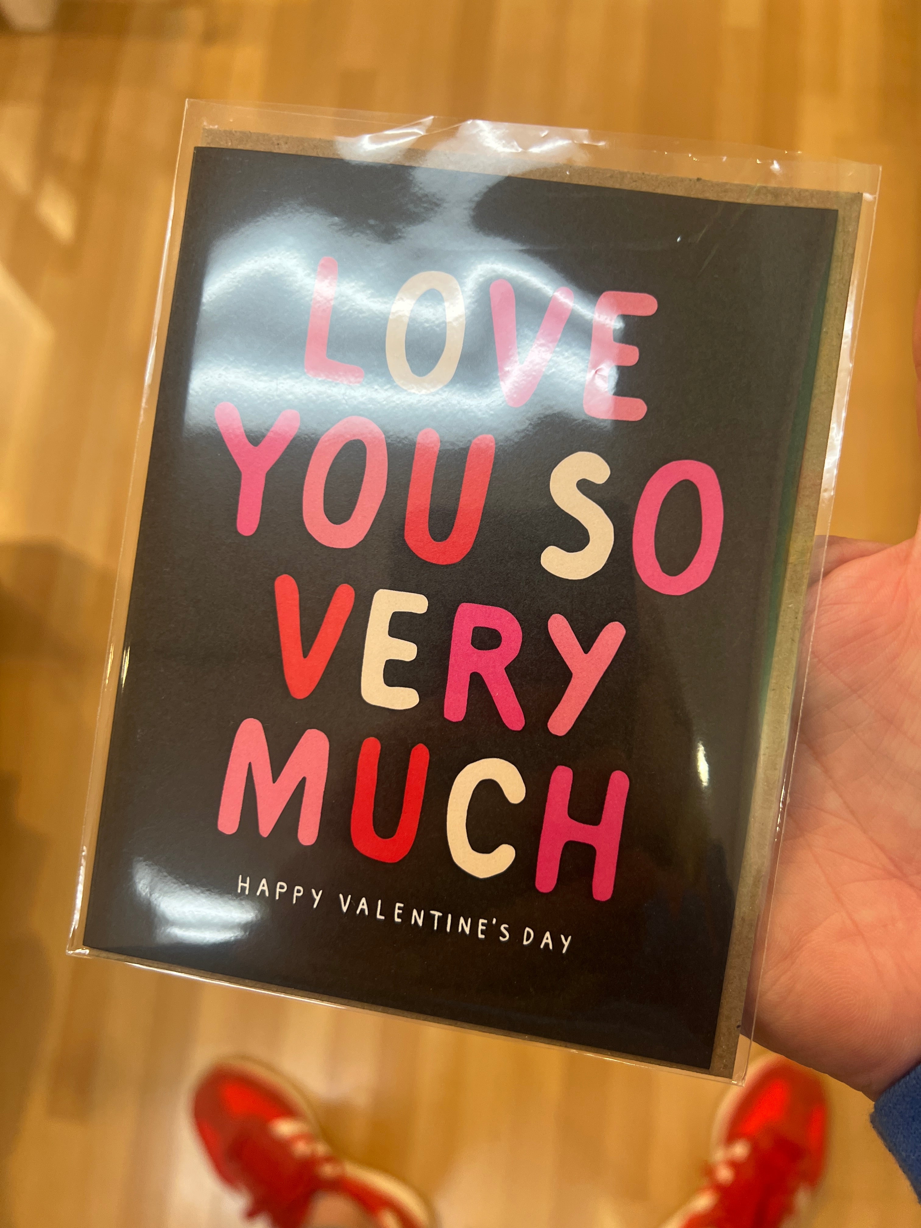 Stylish Valentine's Day card featuring bold letters saying 'LOVE YOU SO VERY MUCH,' created by ARTISANS & agency for their Valentine's Day Card Collection.