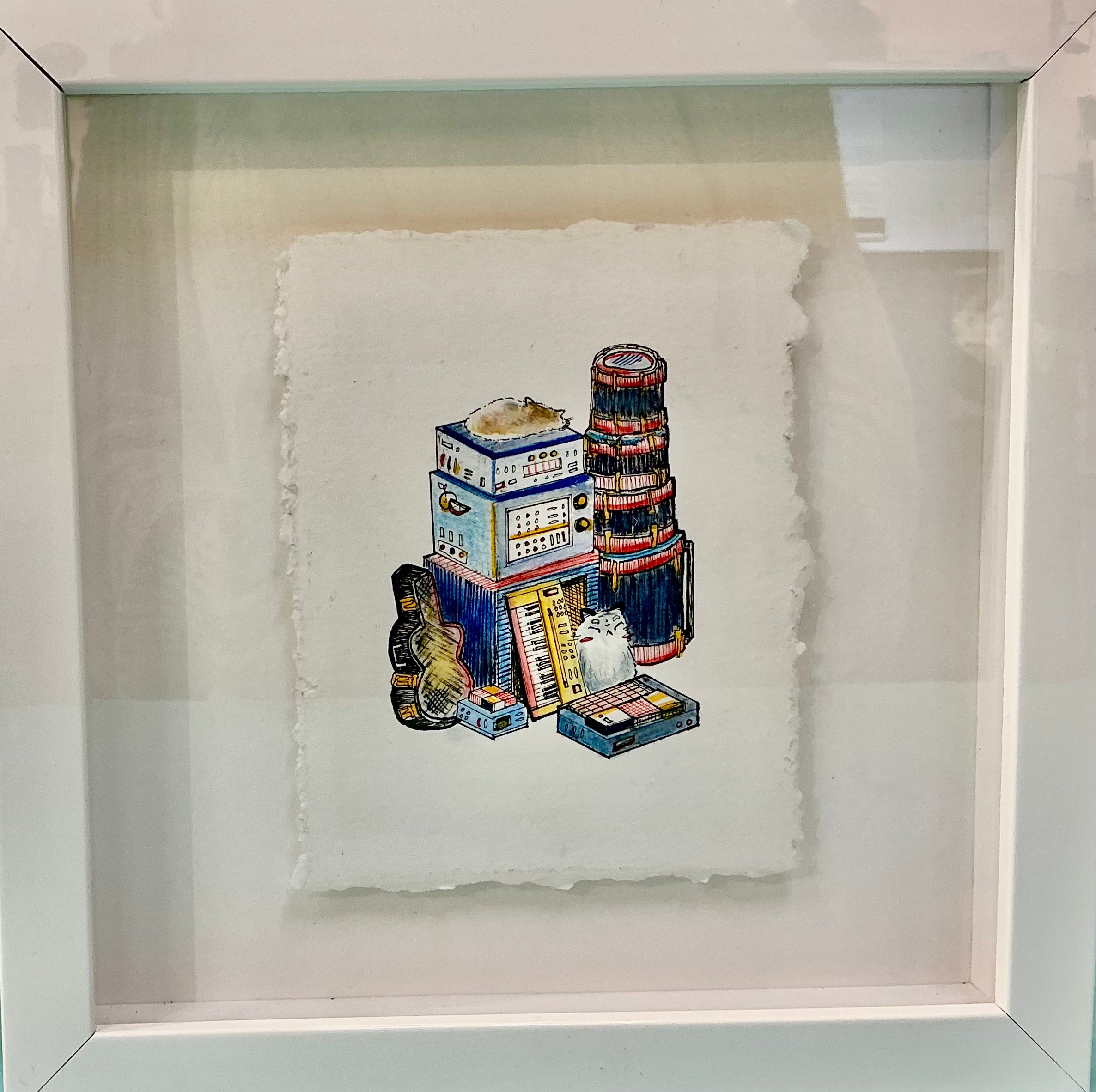 Framed artwork by Mari Minjoe titled 'Music Gear', featuring an imaginative illustration of musical instruments and equipment, created using pen, ink, and watercolor.