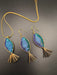 Breeze Chic | Golden Blue Fish Necklace, handcrafted paper quilling jewelry design in blue and gold