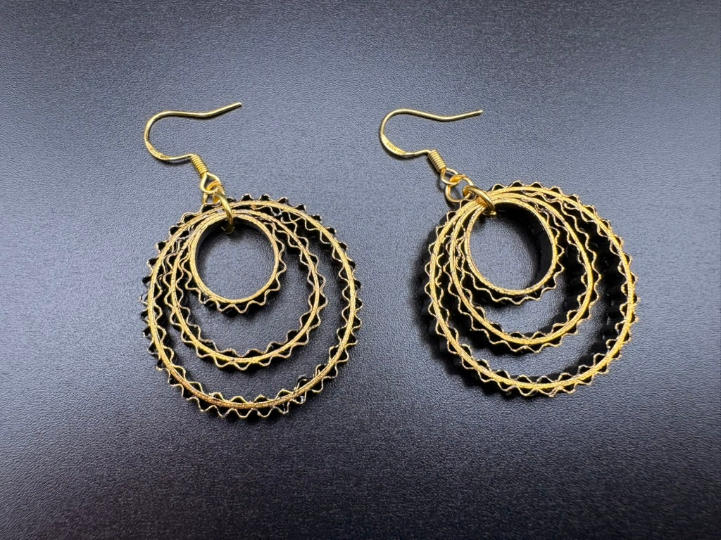 Breeze Chic | Golden Orbit handcrafted paper quilling artwork featuring an intricate golden heart design