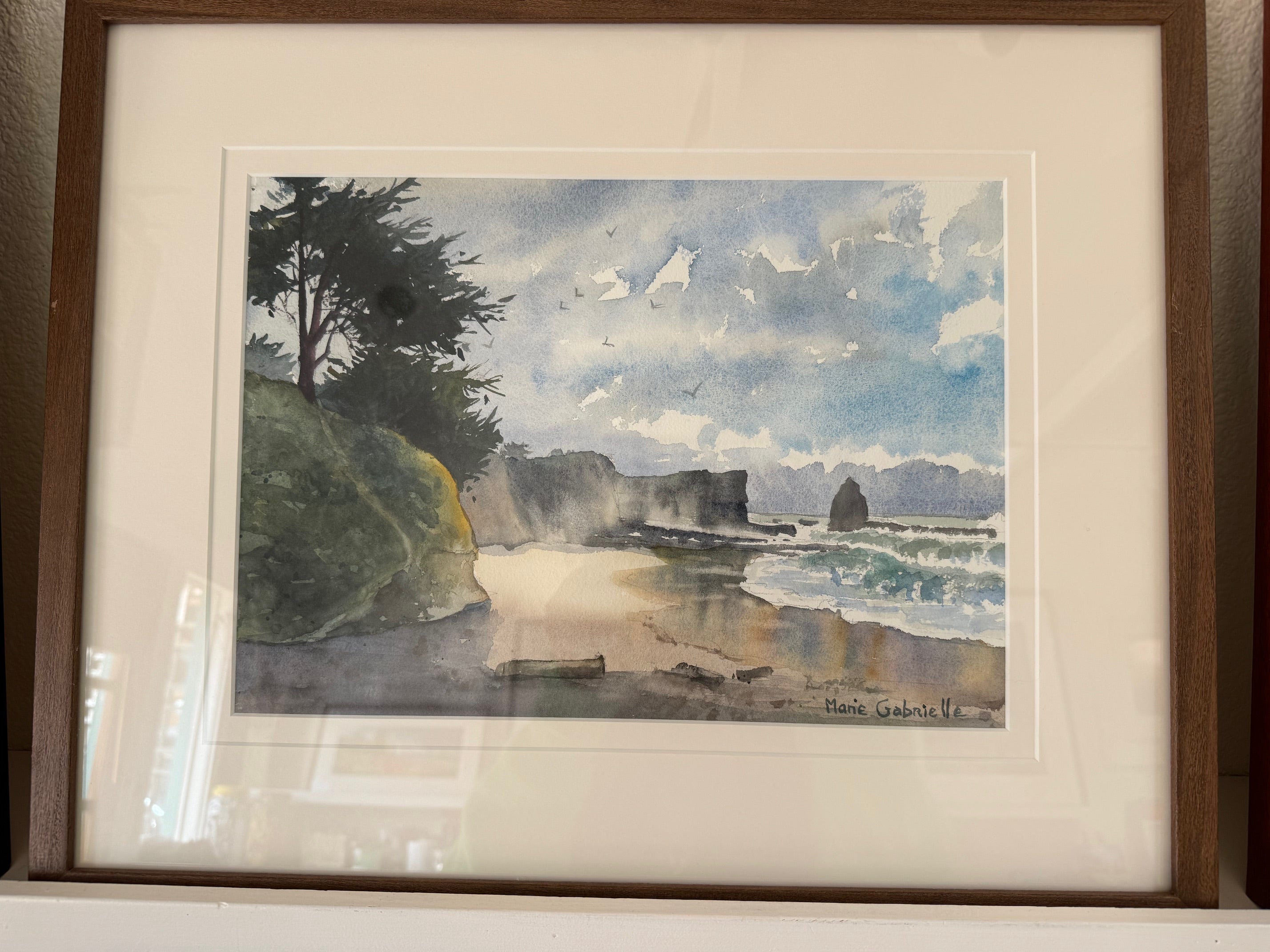 bluff and ocean waves watercolor print in wood frame
